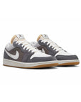Nike Air Jordan 1 Low SNKRS Day Grigio e Bianco