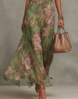 Isabella | Abito lungo a fiori con collo halter per donna
