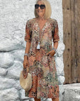 Emily | Vestito midi floreale con scollo a V e tasche per donna taglia plus