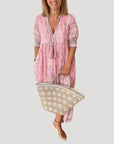 Evie | Abito midi bohemien fluido da donna con scollo a V
