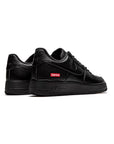Nike Air Force 1 Low Nera con Dettagli Supreme Rosso