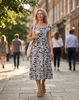 Vestito midi da donna Lucie in cotone satinato – Vestito volanté con collo rotondo