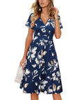 Vestito da donna Evania – Scollo a V incrociato, taglio a linea A e tasche, lunghezza al ginocchio elegante