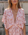 Abito lungo rosa da donna con scollo a incrocio