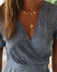 Abito midi donna con scollo a V