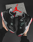Nike Air Jordan 4 Retro Bred Reimagined sneakers alte in nero rosso - vista laterale