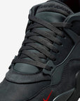 Nike Air Jordan 4 Retro Nigel Sylvester Driveway Grey sneakers alte in grigio - dettaglio suola