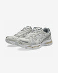 Asics Gel-Kayano 12.1 Cream Smoke Grey sneakers basse uomo e donna in mesh, pelle sintetica e pelle crema grigio, vista front