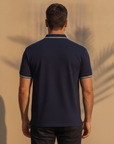 Polo Uomo con Bordi a Contrasto – Colletto e Polsini Rigati Eleganti - vista posteriore