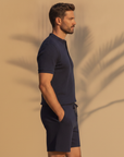 Completo Coordinato Uomo Polo Piqué Testurizzata e Pantaloncini - vista laterale