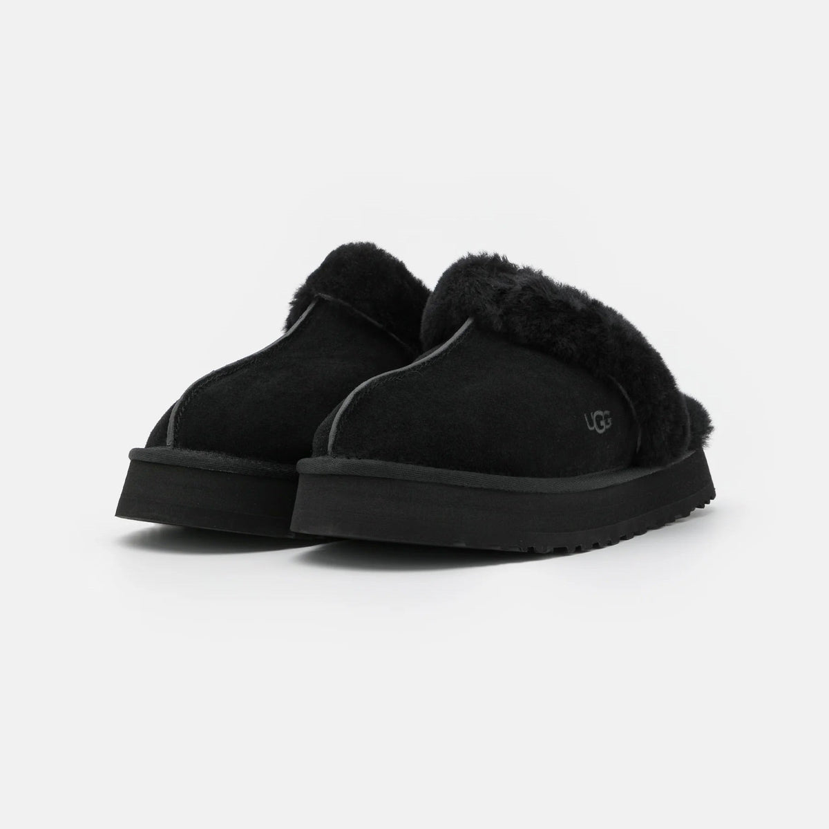 UGG Disquette Black sabot donna in pelle scamosciata e montone nero, dettaglio suola