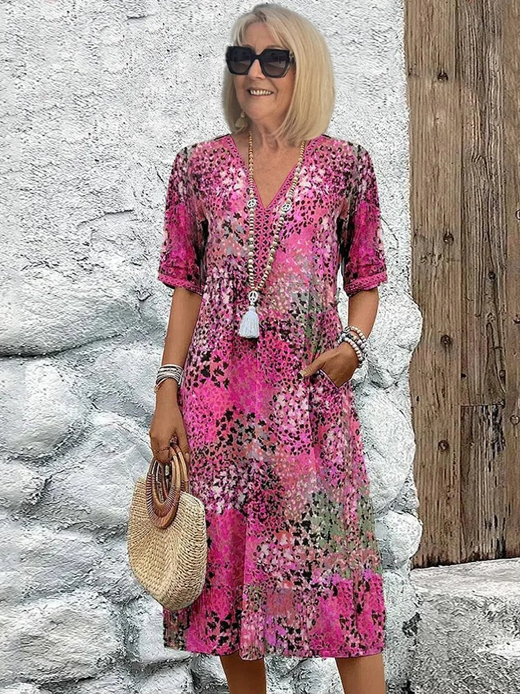 Emily | Vestito midi floreale con scollo a V e tasche per donna taglia plus