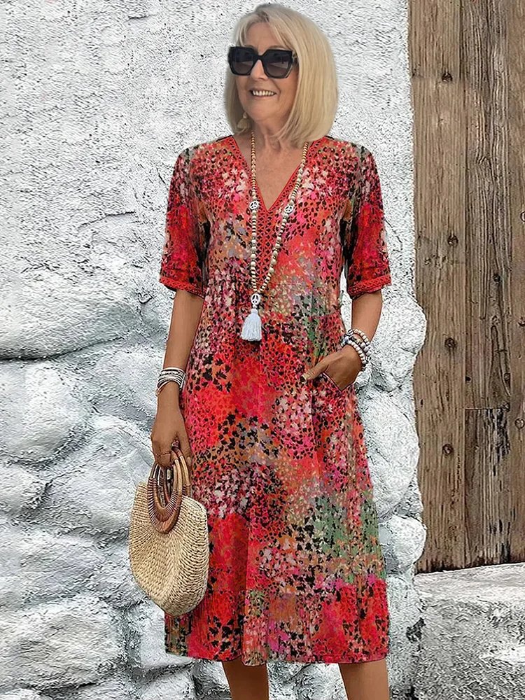 Emily | Vestito midi floreale con scollo a V e tasche per donna taglia plus