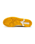 New Balance 550 Scarpe Uomo Bianche e Giallo Oro Stile Retro Sportivo