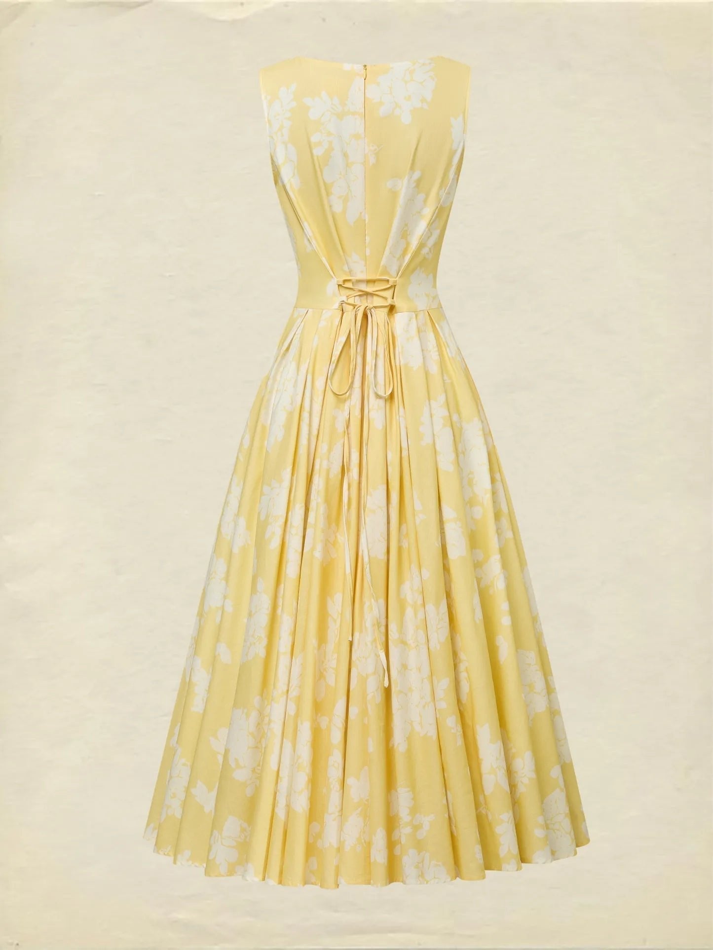 Scarlett | Abito midi a linea ad A senza maniche con stampa floreale da donna