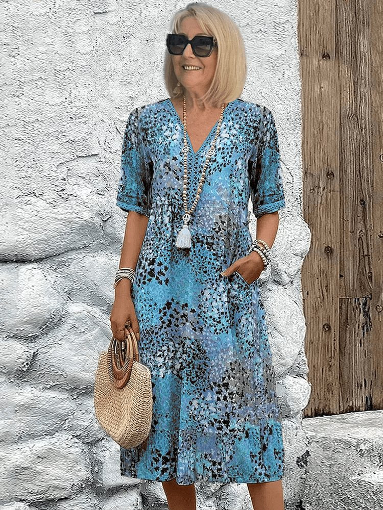 Scarlett | Vestito midi estivo casual da donna con scollo a V e stampa animalier