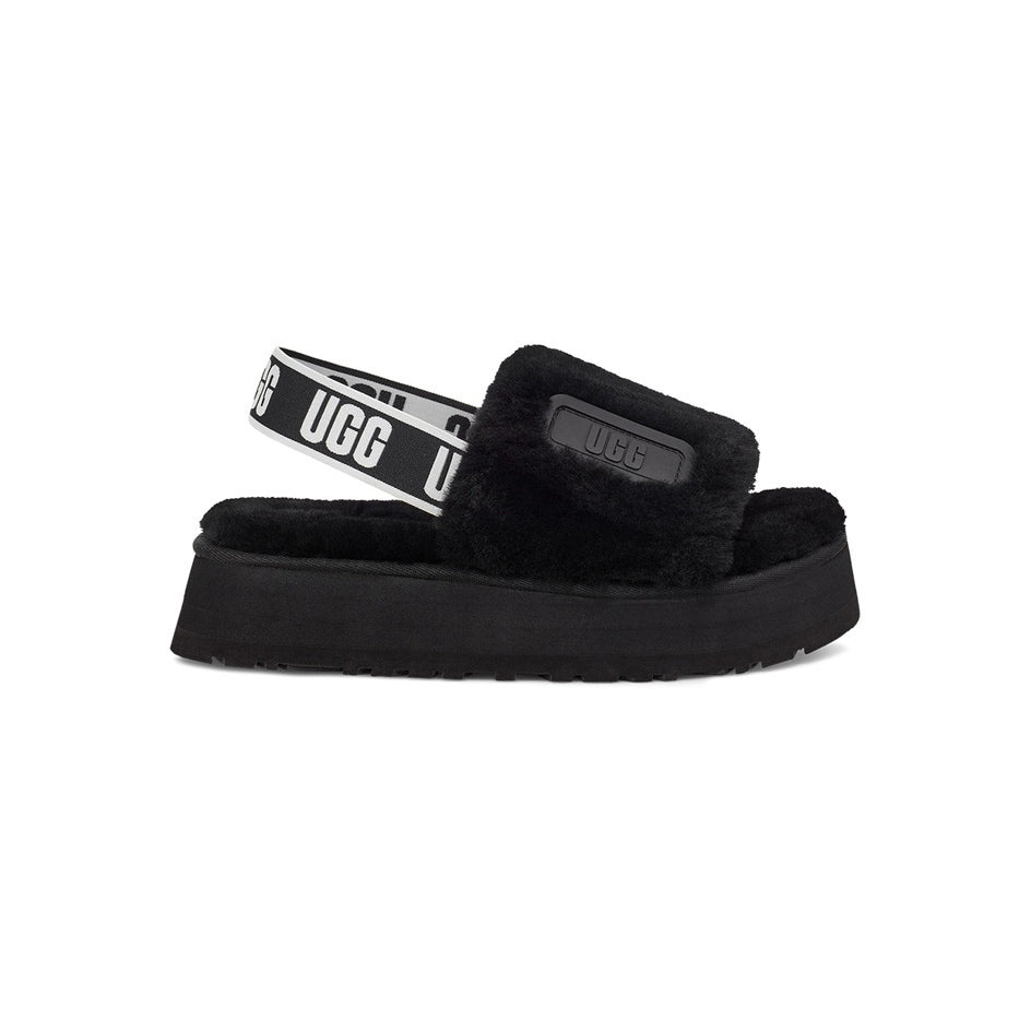 UGG Disco Slide Black ciabatte uomo e donna in montone nero, vista laterale