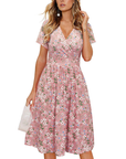 Vestito da donna Evania – Scollo a V incrociato, taglio a linea A e tasche, lunghezza al ginocchio elegante