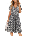 Vestito da donna Evania – Scollo a V incrociato, taglio a linea A e tasche, lunghezza al ginocchio elegante