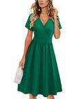 Vestito da donna Evania – Scollo a V incrociato, taglio a linea A e tasche, lunghezza al ginocchio elegante