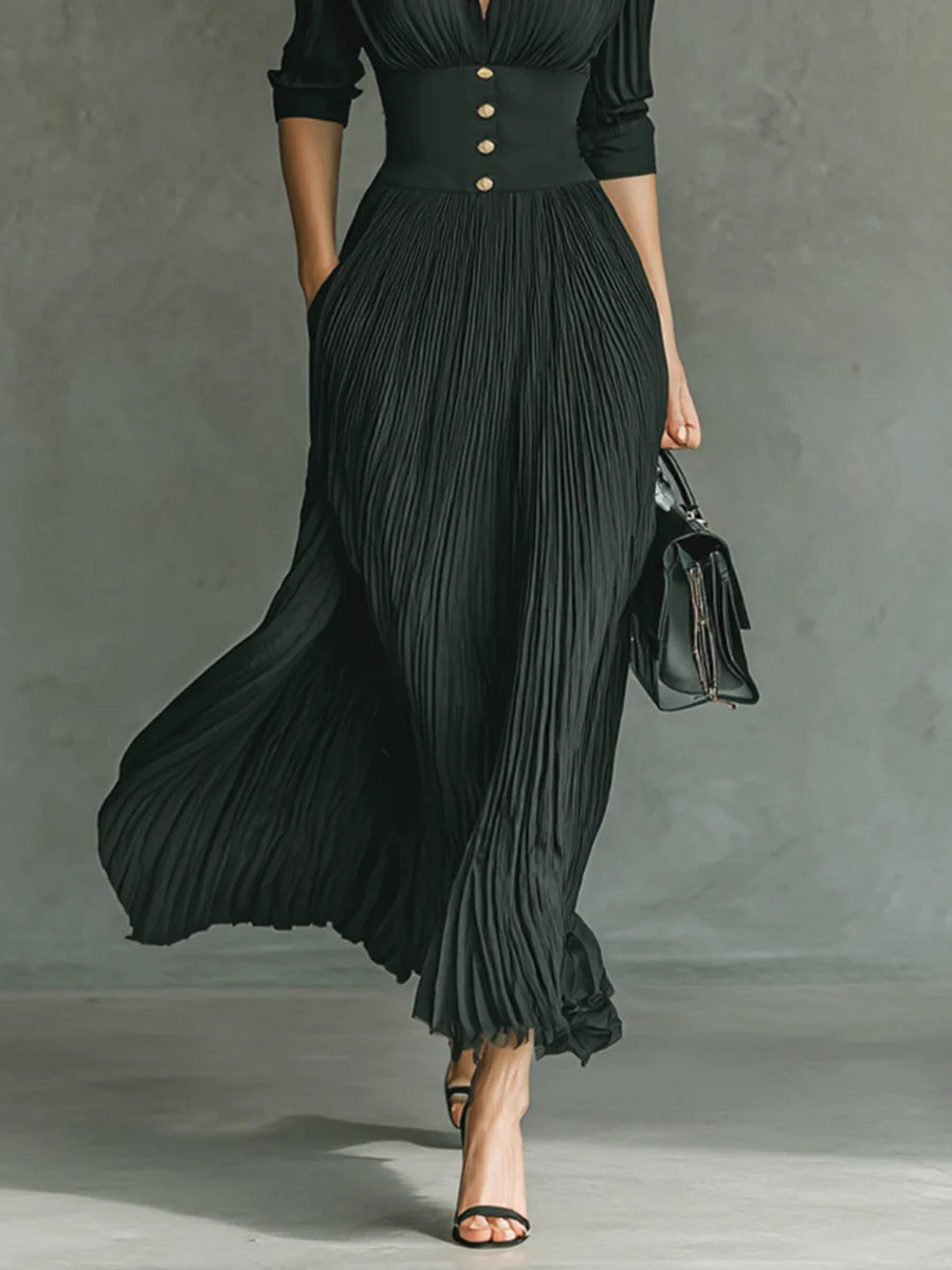 Abito lungo da donna elegante con collo a rever e vita plissettata