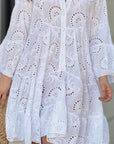 Vestito corto a balze con motivo da donna