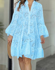 Vestito corto a balze con motivo da donna