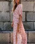 Abito lungo rosa da donna con scollo a incrocio