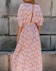 Abito lungo rosa da donna con scollo a incrocio
