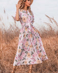 Abito lungo da donna con volant