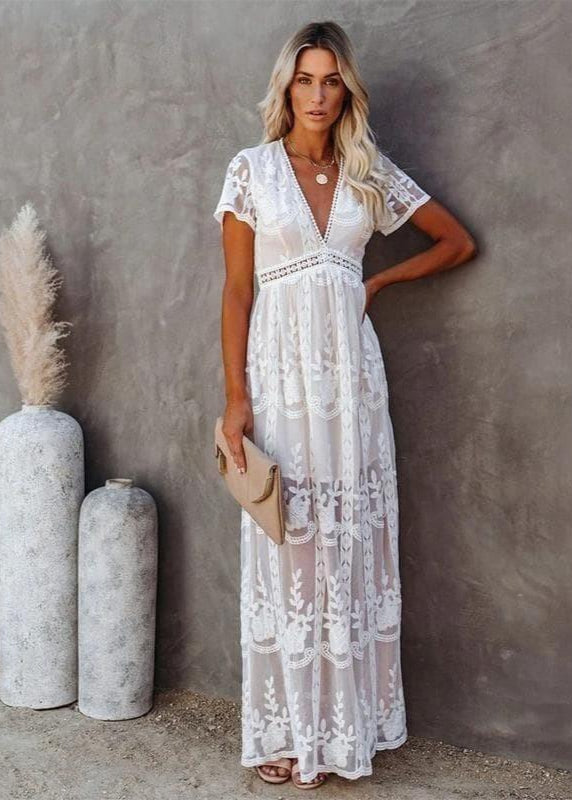 Abito lungo da donna in pizzo bianco