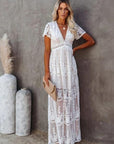 Abito lungo da donna in pizzo bianco