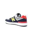 new balance 574 navy yellow scarpe uomo