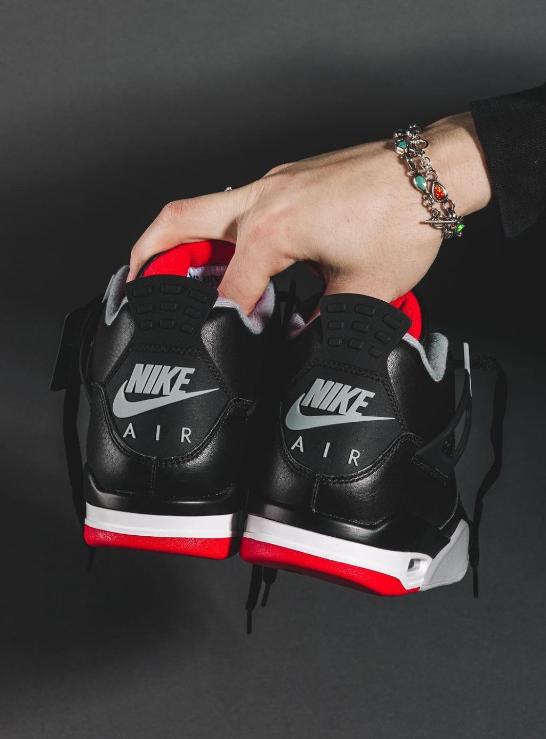 Nike Air Jordan 4 Retro Bred Reimagined sneakers alte in nero rosso - vista frontale