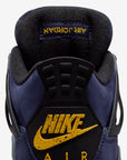 Nike Air Jordan 4 Retro Lakers sneakers alte in viola giallo - indossate