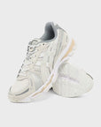 Asics Gel-Kayano 12.1 Cream Smoke Grey sneakers basse uomo e donna in mesh, pelle sintetica e pelle crema grigio, dettaglio t