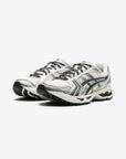 Asics Gel-Kayano 14 Kith Cream Scarab (2024) sneakers basse uomo e donna in mesh e pelle sintetica crema, vista frontale