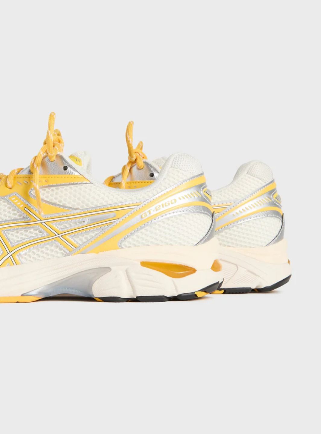 Asics GT-2160 Kith Cream Solar Power (2025) sneakers basse uomo e donna in mesh e pelle sintetica crema, indossate