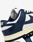 Nike Dunk Low Vintage Navy sneakers basse donna in pelle blu, dettaglio tallone