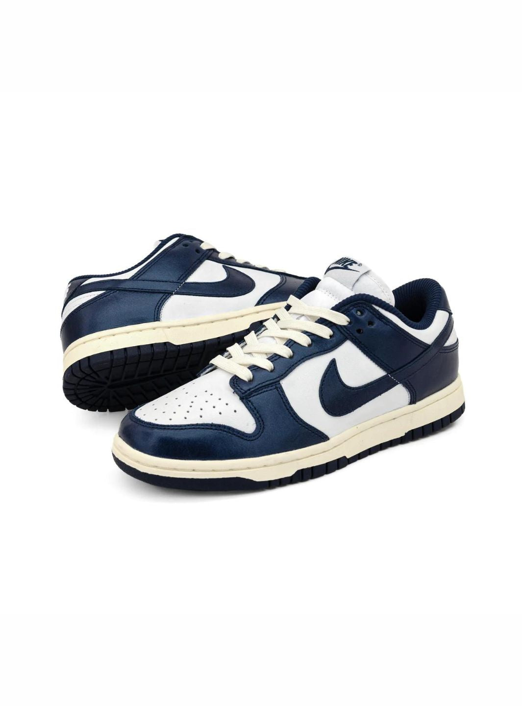 Nike Dunk Low Vintage Navy sneakers basse donna in pelle blu, dettaglio suola