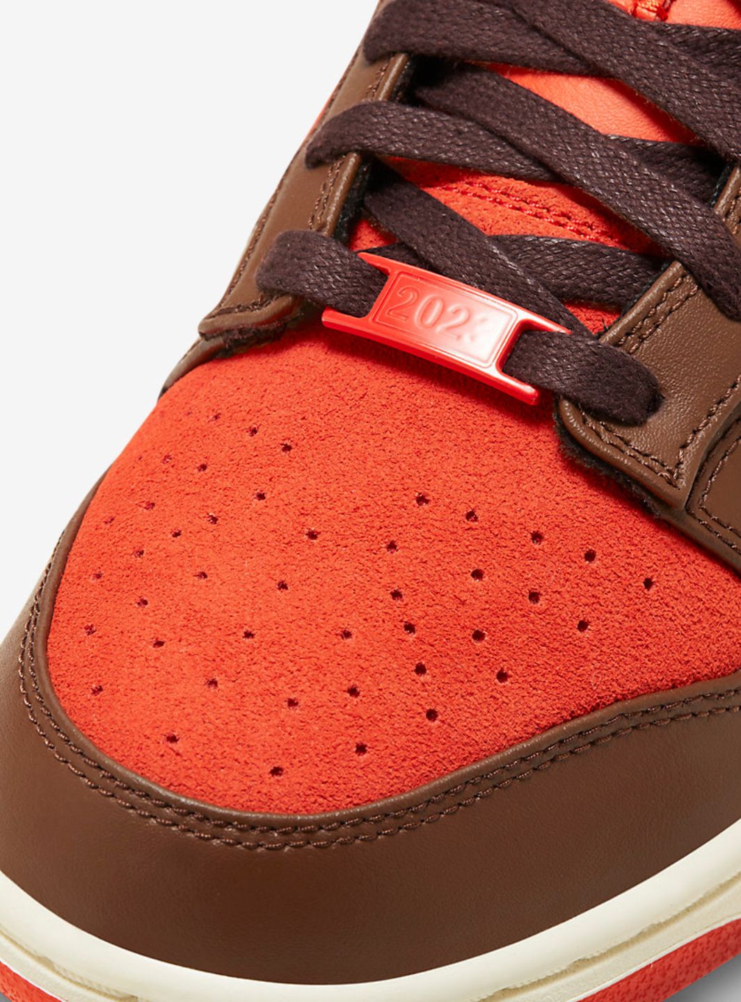 Nike Dunk Low Retro Year of the Rabbit Light Crimson (2023) sneakers basse uomo e donna in pelle rosso, dettaglio suola