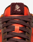 Nike Dunk Low Retro Year of the Rabbit Light Crimson (2023) sneakers basse uomo e donna in pelle rosso, indossate