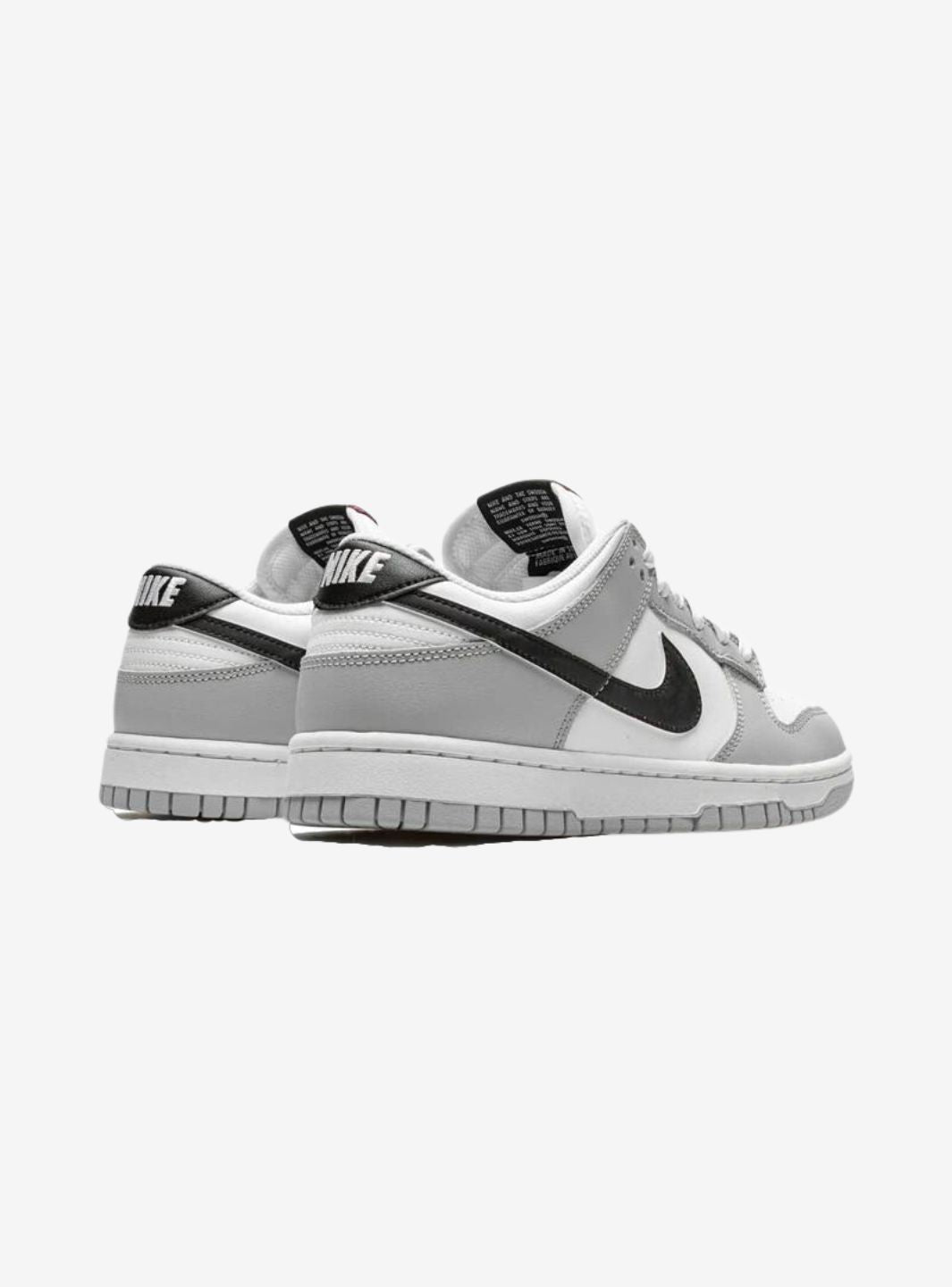 Nike Dunk Low Jackpot sneakers basse uomo e donna in pelle bianco nero, dettaglio suola
