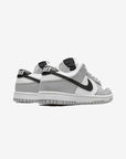 Nike Dunk Low Jackpot sneakers basse uomo e donna in pelle bianco nero, dettaglio suola