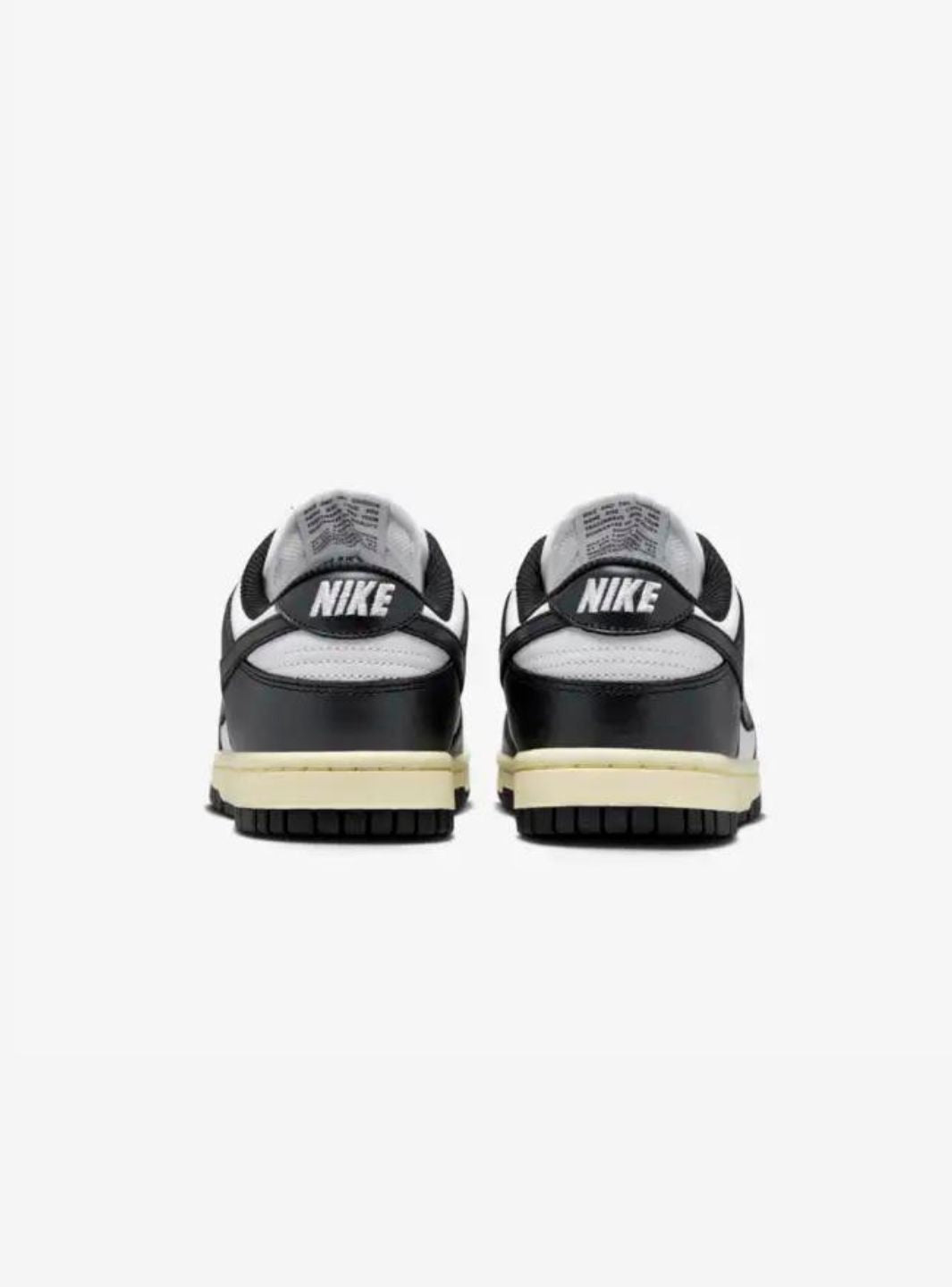 Nike Dunk Low Vintage Panda sneakers basse donna in pelle nero bianco, dettaglio suola