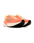 new balance fuelcell rebel v5 tangerine heat silver metallic scarpe donna